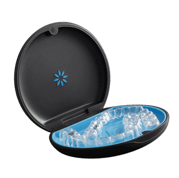 Black oval dental gel ice pack with blue cooling gel interior, open and closed views shown.
