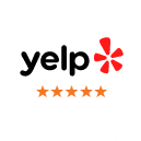 Yelp logo with five gold stars indicating excellent customer reviews for Riggs Family Dental