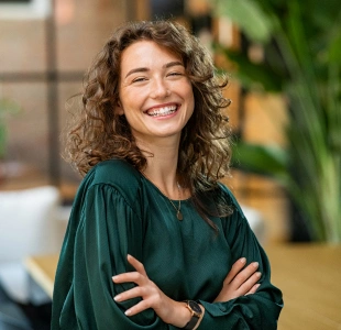 Smiling patient showing a confident, healthy smile after cosmetic dentistry