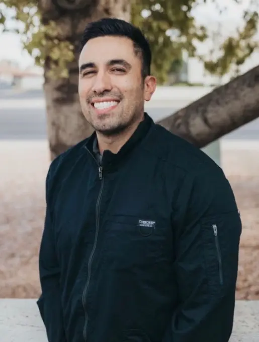 Dr. J. Andrew Andrino smiling outdoors in Chandler, Arizona.